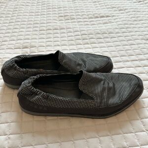 Prada slip-on shoes in a grey and black houndstooth pattern